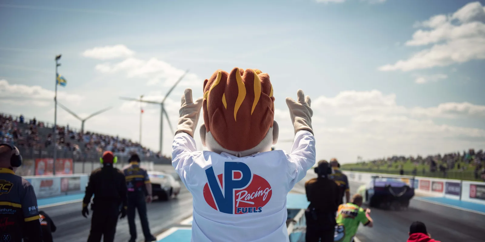 VP Racing mascot at the start line in front of a full grandstand